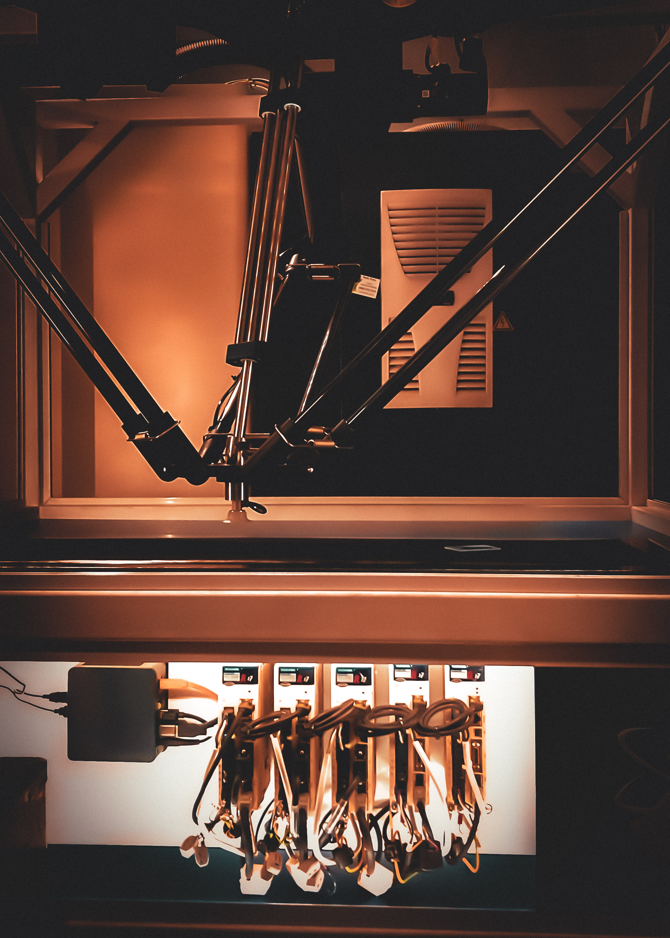 Delta robot panel and arm assembly